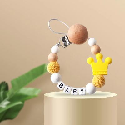 attache tetine perle corone innotive